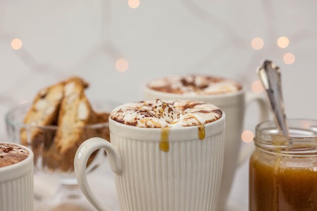 Close-up of coffee cups on table