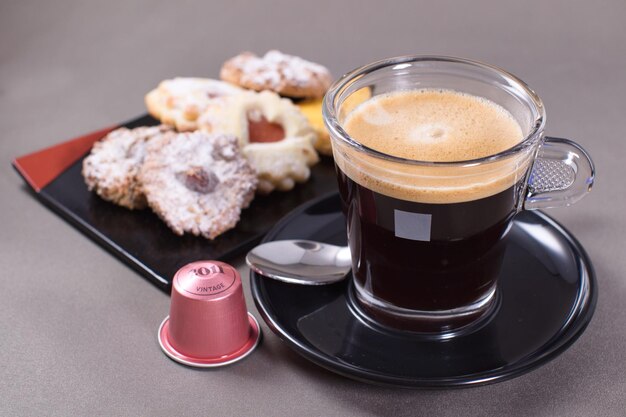 Close-up of coffee and cups on table