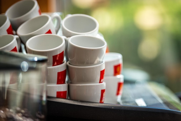 Close-up of coffee cups on table