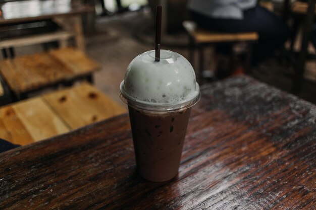 Close-up of coffee in glass on table