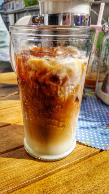 Close-up of coffee in glass on table