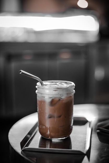 close-up of coffee in glass on table