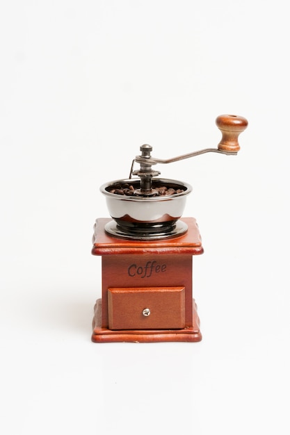 Close up coffee grinder on white background.