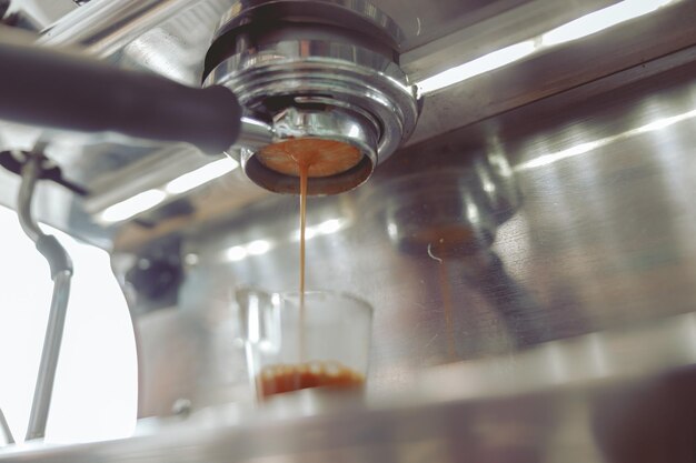 Close up of coffee machine preparing espresso