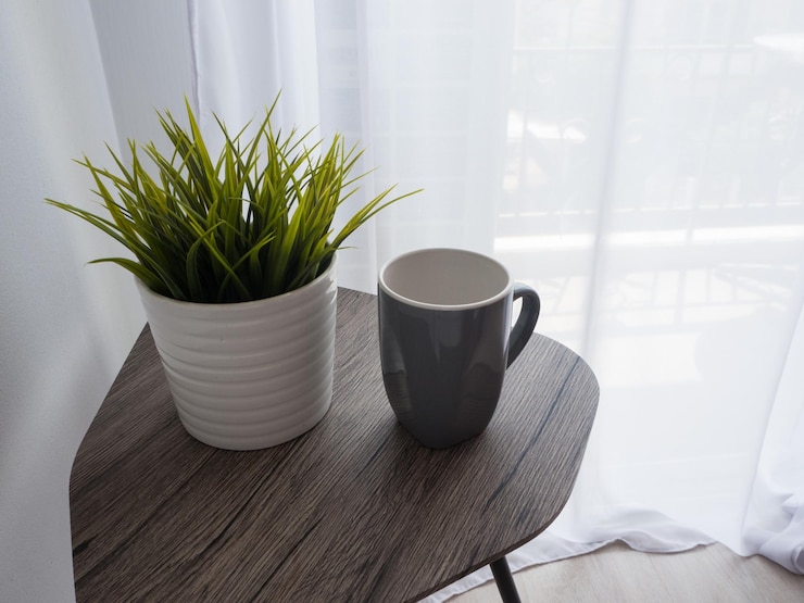 Photo close-up of coffee served on table at home