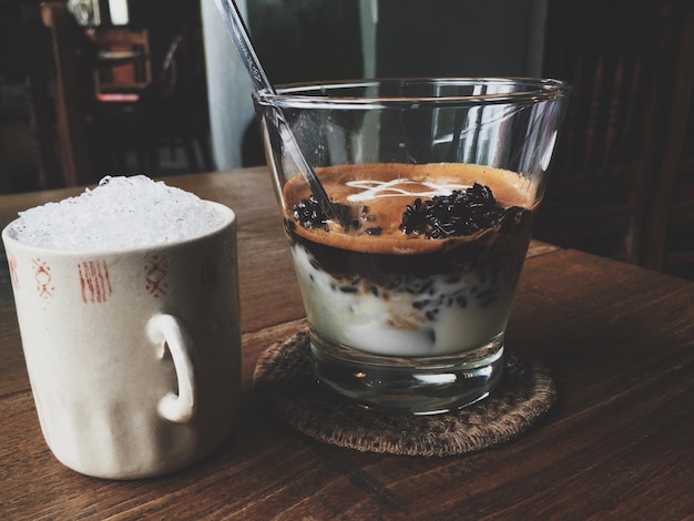 Close-up of coffee served on table