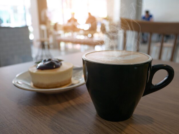 Photo close-up of coffee served on table