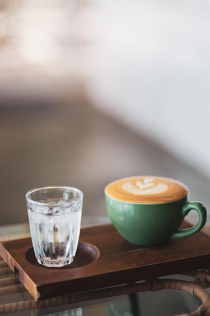 close-up of coffee with drinking glass on table