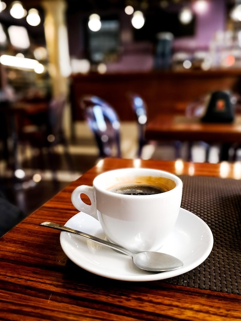 Close-up of coffee on wooden table