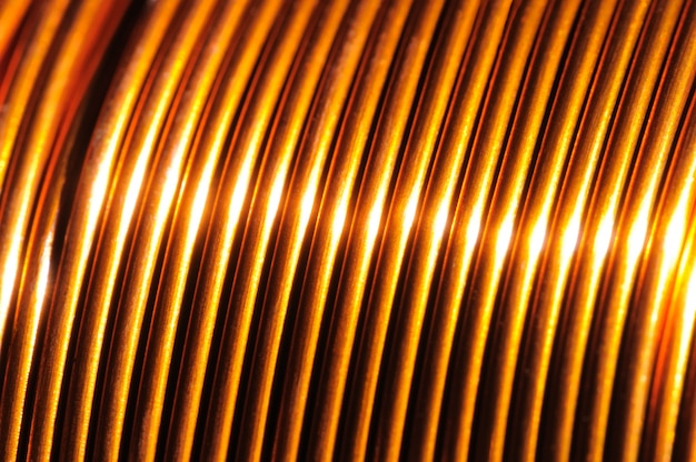 Close-up of a coil of red copper wire