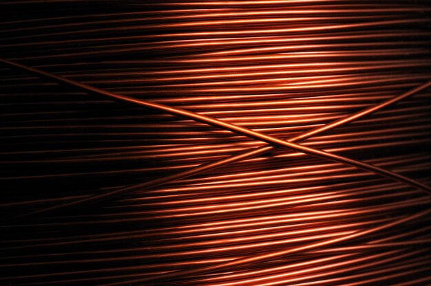 Close-up of a coil of red copper wire