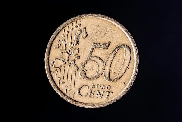 Photo close-up of coin against black background