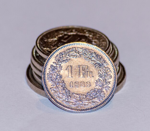 Close-up of coin against white background