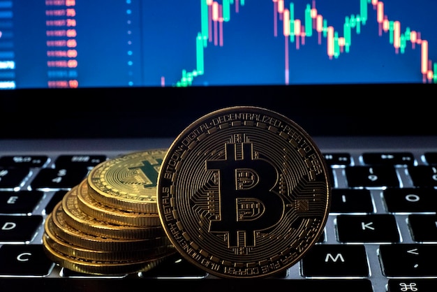 close-up of coins on laptop