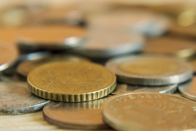 Close-up of coins on table