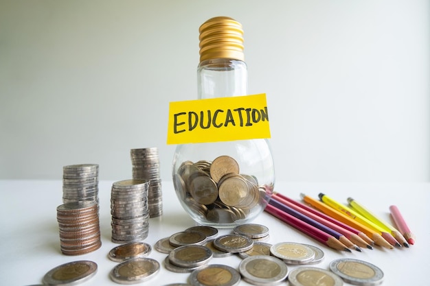 Photo close-up of coins over white background