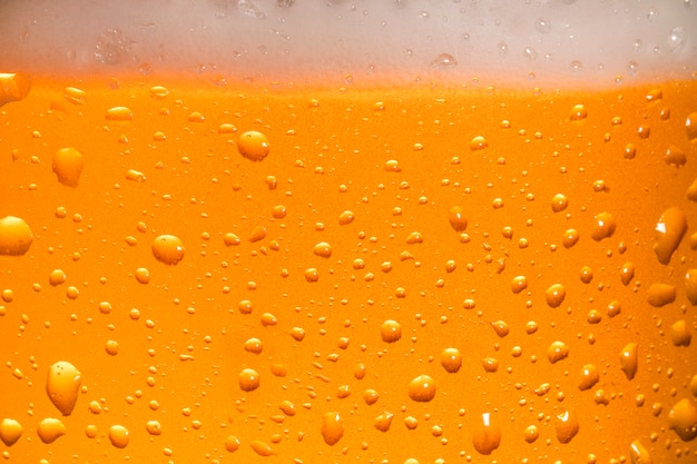 Close up  of cold beer with drops and bubbles