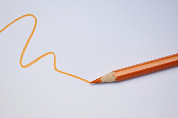 Photo close-up of colored pencil against white background