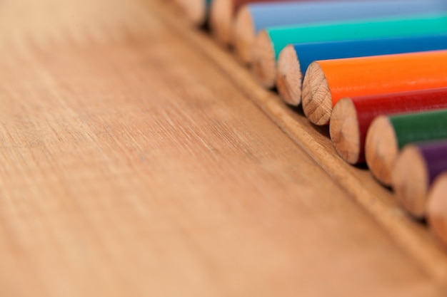 Close-up of colored pencil in a row