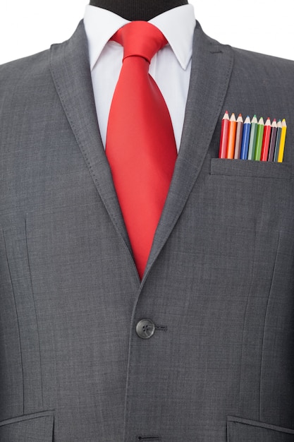 Photo close-up of colored pencils in coat pocket