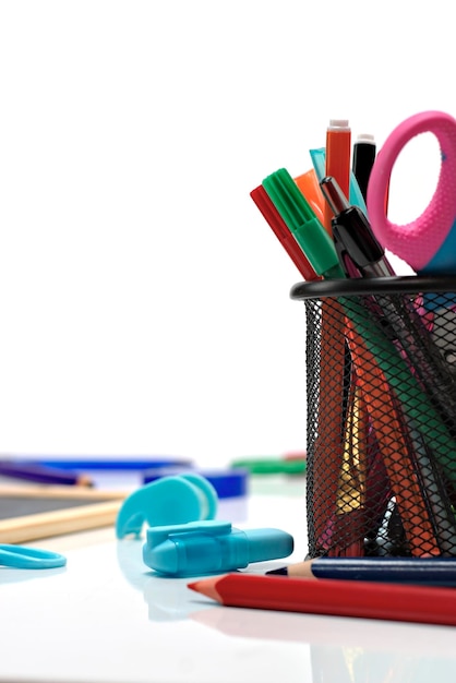 Photo close-up of colored pencils on table against white background