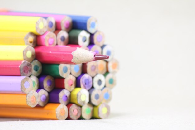 Close-up of colored pencils on table