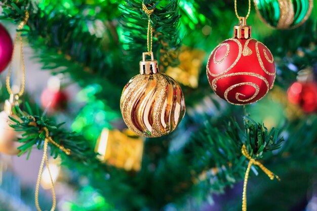 Close up colorful bauble on Christmas tree