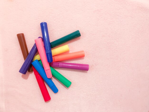 Close-up of colorful felt tip pens on table