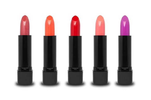 Close-up of colorful lipsticks on white background