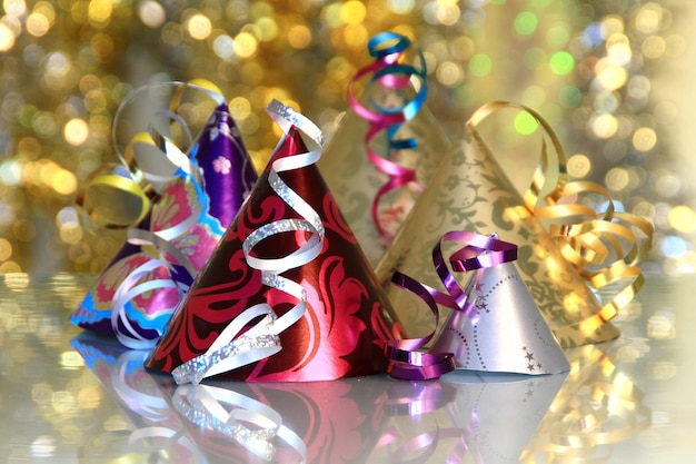 Photo close-up of colorful party hats on table