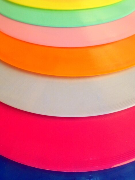 Photo close up of colorful plastic plates