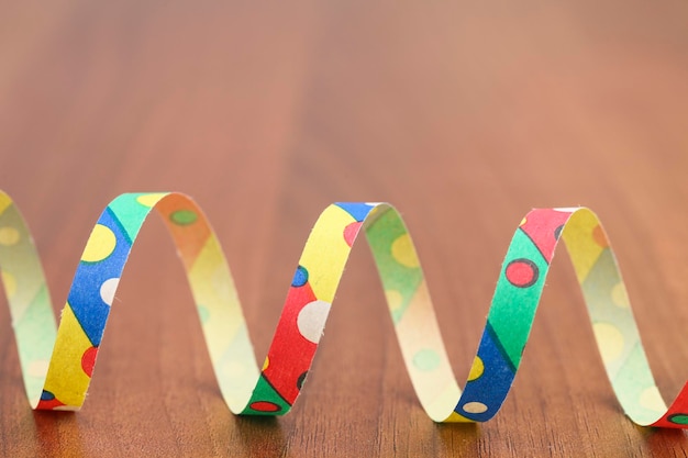 Photo close-up of colorful swirl paper on table