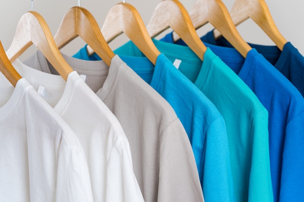 Close up of Colorful t-shirts on hangers
