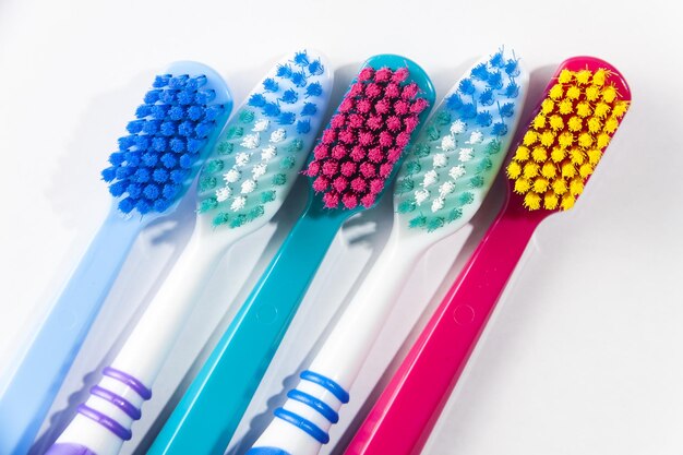 Close-up of colorful toothbrush over white background