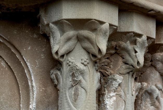 A close up of a column with a dragon on it