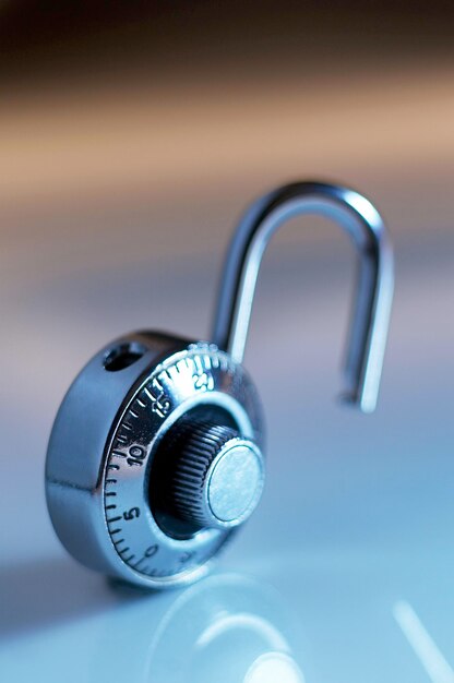 Photo close-up of combination lock on table