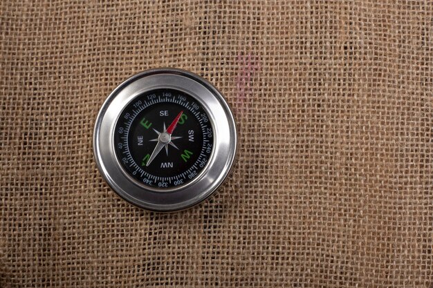 Photo close up of compass on an office desk