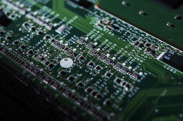 A close up of a computer board with a large number of small circles on it.