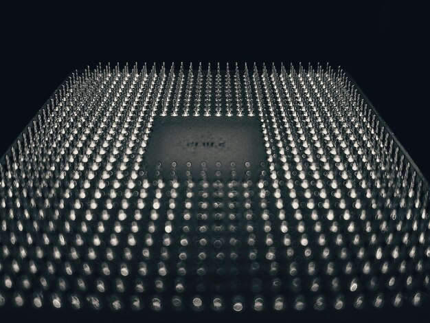 Close-up of computer chip against black background