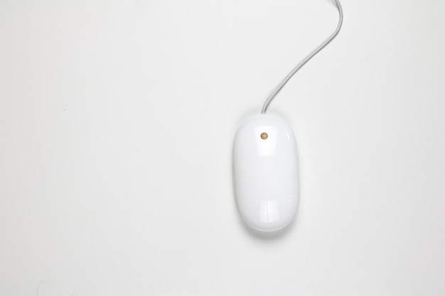 Photo close-up of computer mouse on white background