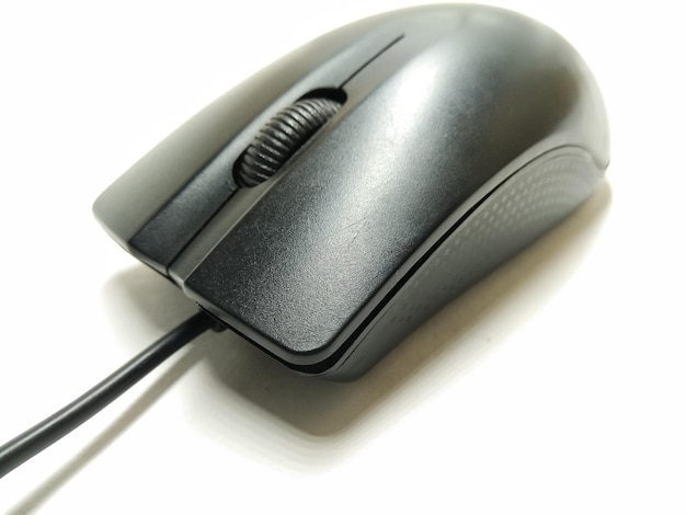 Photo close-up of computer mouse on white background