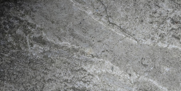 A close up of a concrete wall with a white background.