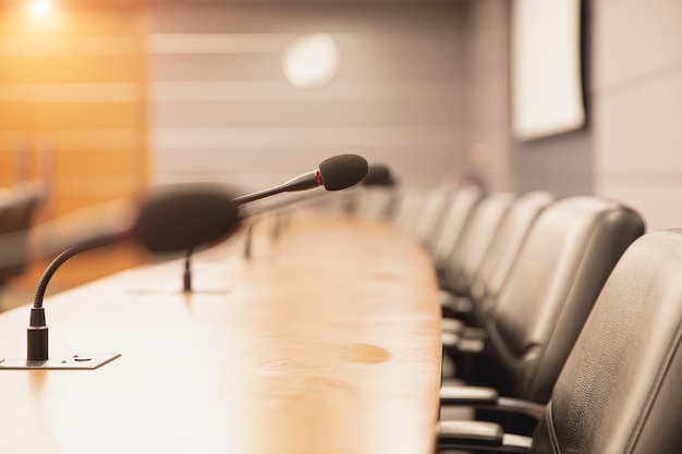 Close up the conference microphone on the meeting table.