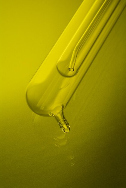 close-up of container on yellow table against wall