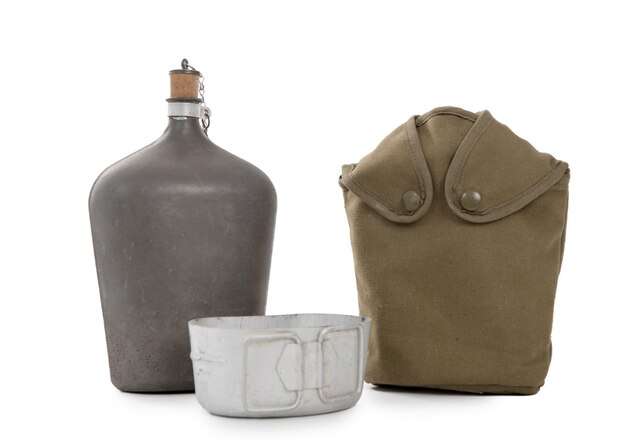 Photo close-up of containers and bag against white background