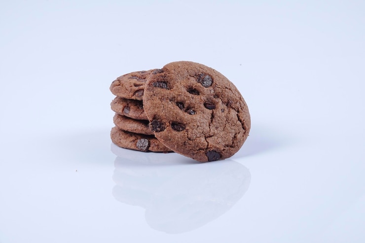 Photo 白い背景のクッキーのクローズアップ
