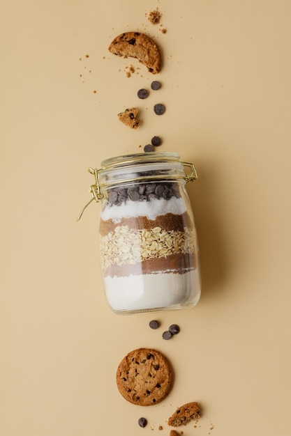 Photo close-up of cookies in glass jar on table