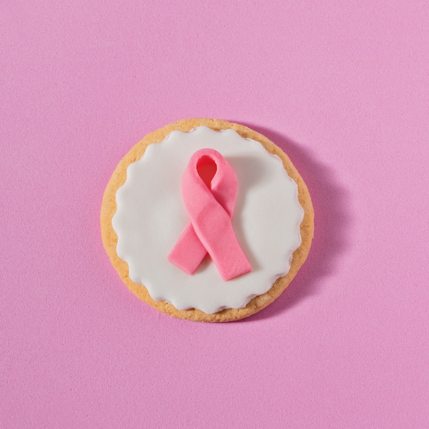 Close up cookies with pink ribbon