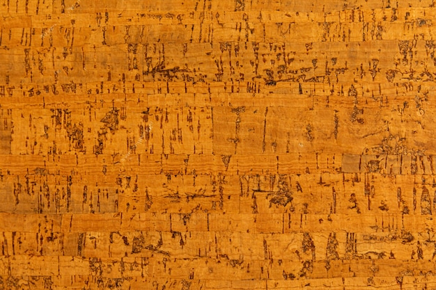 Photo close-up of cork sound insulation lagging of carrot color for floors and walls