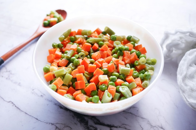 Close up of corn carrot and beans in a bowl